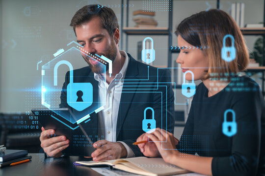 Business professionals discussing cybersecurity with digital lock graphics.