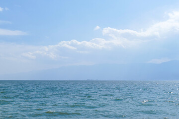 Fototapeta premium Erhai Lake, China - March 27th, 2024: A beautiful day at Erhai Lake, China.