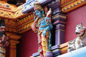 Vishnu or Narayana on the roof of a Hindu temple in Kerala.