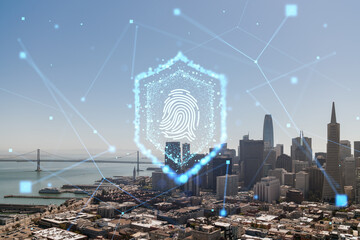 Digital fingerprint security hologram over city skyline.