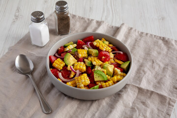 Healthy Fresh Corn Salad in a Bowl, side view.