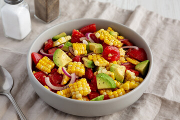 Healthy Fresh Corn Salad in a Bowl, side view.
