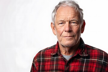 Portrait of a Senior Man Wearing a Red Plaid Shirt