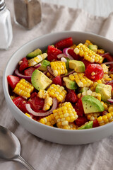 Healthy Fresh Corn Salad in a Bowl, side view.