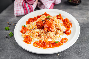 couscous with meat balls vegetable sauce tasty fresh meal food snack on the table copy space food background rustic top view keto or paleo diet