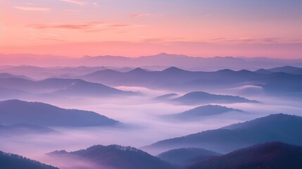 Fototapeta premium the serene beauty of sunrise over mist-covered mountains with soft pastel colors. sunrise over misty mountains, beautiful nature and wild landscape