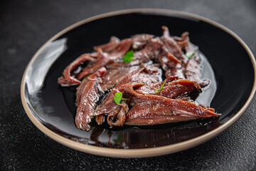 anchovies canned fish in oil fresh and tasty seafood meal food snack on the table copy space food background rustic top view 