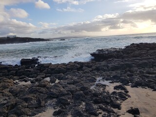 Obraz premium beach with rocks and sea