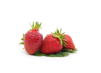 Ripe strawberry with leaves.