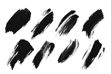 Strokes of black paint, brush, roller, spatula. Collection of brushes Smears of paint on a white background for your design