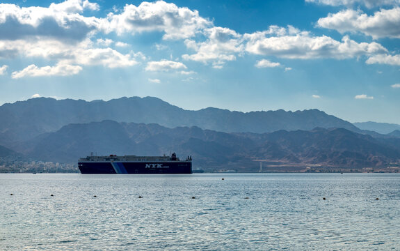 Eilat, Israel &ndash; April 29, 2023: Cargo ship of NIK Line in the roadstead near the seaport of Eilat. The NYK is the largest Japanese shipping company, it has branches with vessels in many European count