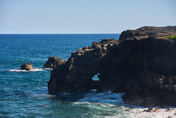Fototapeta premium Coastline rock formations on the south part of Mauritius island, Le Souffleur, Pont Naturel, Africa