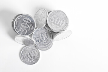 Silver coins stacks isolated on a white background. Indonesian rupiah coin. 500 rupiah coin. metal money