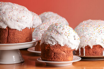 Flour pastries with white icing and colorful balls