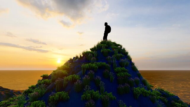 Silhouette of a man who successfully climbed to the top of a mountain