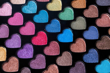 Heart Shaped Eyeshadow Set. Eyeshadow palette with colorful heart shaped refills close-up.