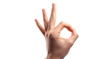 Close-up of a hand making an OK gesture, symbolizing agreement or approval. Isolated on a white background, this image signifies positivity.