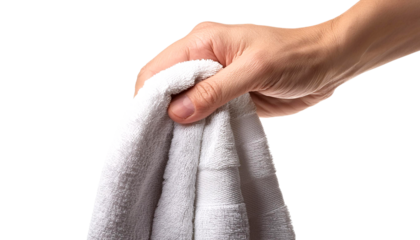 Hand holding a soft white towel, perfect for bathroom, spa, or hotel use. Emphasize cleanliness and comfort.
