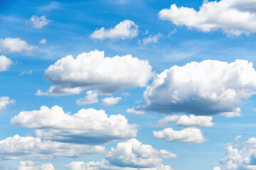 Many small fluffy clouds high up in the sky. Aerial view, abstract nature background