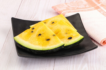 Sweet and juicy yellow watermelon slices