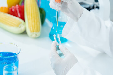 Scientist check chemical food residues in laboratory. Control experts inspect quality of fruits,...