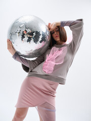 Fototapeta premium Fashion shooting in studio . Professional model , fashionable clothes and style, new collection. stylish look