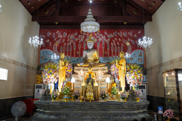 Phra Nakhon Si Ayutthaya District, Wat Yai Chai Mongkhon, Thailand, July 07, 2024, Golden Buddha Shrine in Thai Temple..