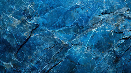 Obraz premium A close-up of a vibrant blue stone texture background. The surface showcases intricate patterns and natural variations, capturing the beauty of the stone's unique structure.