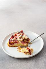 Piece of plum cake on a plate
