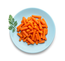 Baby carrots and green leaf isolated on white, top view