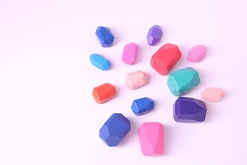 Many colorful balancing stones on white background, above view. Space for text