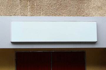 Blank white restaurant or shop sign mockup, large billboard banner on a storefront template.