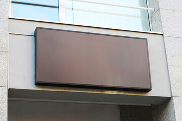 Blank brown restaurant or shop sign mockup, large billboard banner on a storefront template.