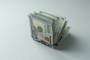 Dollar banknotes on grey background, closeup. American currency