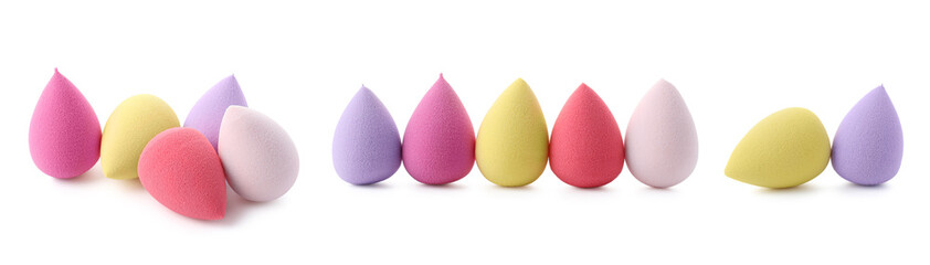 Set with makeup sponges of different colors isolated on white
