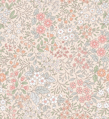 Cute floral pattern in the small flowers. Seamless vector texture. Elegant template for fashion prints. Printing with small orange and pink flowers. Ivory background.