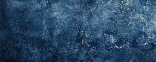 Fototapeta premium Rich navy blue backdrop with a distressed, worn texture, giving it a vintage, rustic appeal.