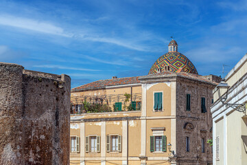 Colorful dome of the medieval Saint Michael Church, Alghero, Sardinia, Italy