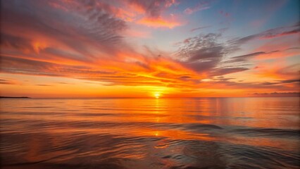 Fototapeta premium Vibrant Sunset Over Calm Ocean Background