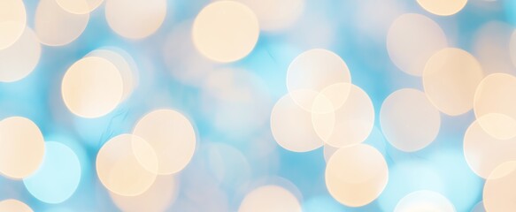 Bright holiday bokeh with hot yellow lights blurred on teal blue background