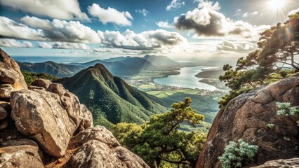 Fototapeta premium View from the top of the mountain, beautiful mountain landscape, mountain vegetation, forest, beautiful clouds, sunlight, mountain plain in the distance