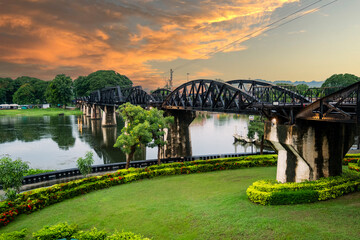 Fototapeta premium Landscape of Bridge River Kwai at Kanchanaburi, Thailand in morning time. Is a famous place and a tourist destination.