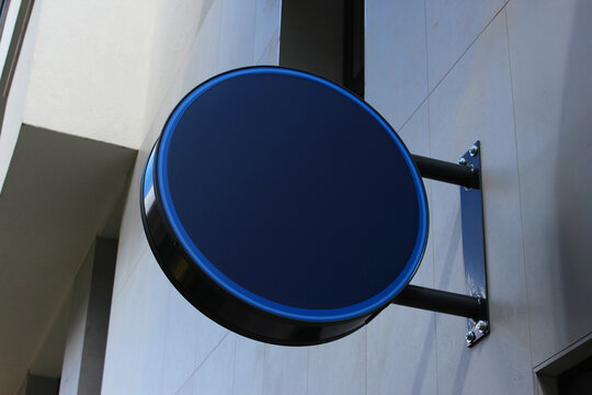 Rounded Street storefront shop, cafe, restaurant mounted signboard mock up design template. Blank white store sign design mockup.