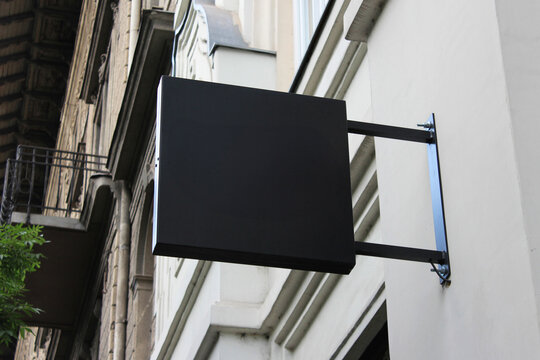 Outdoor hanging mounted sign on the wall mockup template. Signboard mock up for logo presentation.