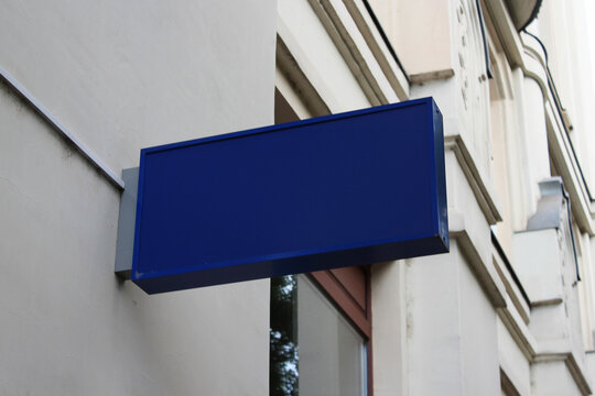 Outdoor hanging mounted sign on the wall mockup template. Signboard mock up for logo presentation.