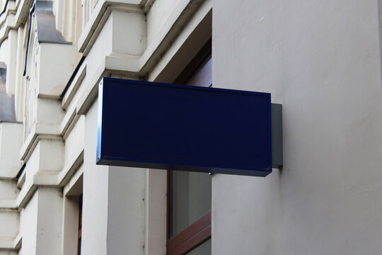 Outdoor hanging mounted sign on the wall mockup template. Signboard mock up for logo presentation.