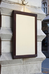 Blank white shop, store or restaurant poster mockup, billboard banner on a wall mock up template.