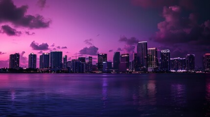 Fototapeta premium City lights reflecting on waterfront at dusk