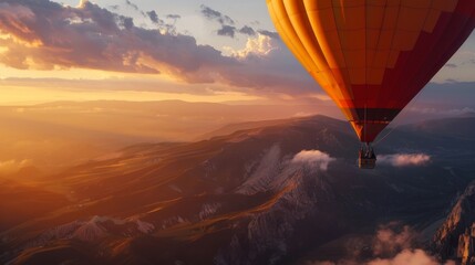 Hot Air Balloon Soaring Above the Mountainous Landscape at Sunset