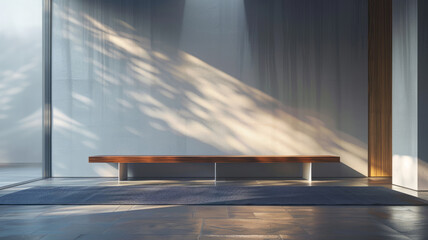 Modern bench bathed in sunlight with shadows on wall